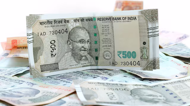 Rupee plunges 50 paise vs US Dollar as crude oil spikes