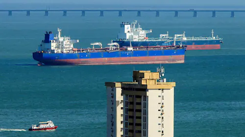 Oil prices surge after a steep drop as Iran gives mixed signals on talks