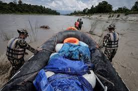 One month into the deadly floods Nepal continues to search for missing people as death toll reaches over 1400